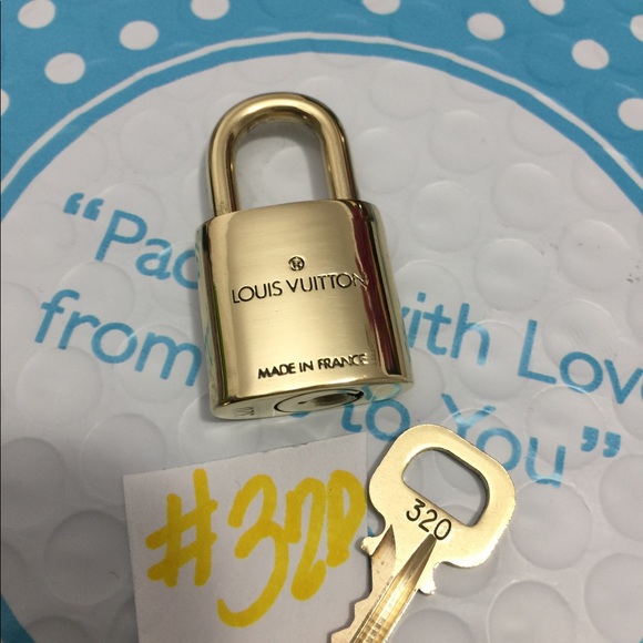 Authentic Louis Vuitton Lock and key 320 - Picture 3 of 5